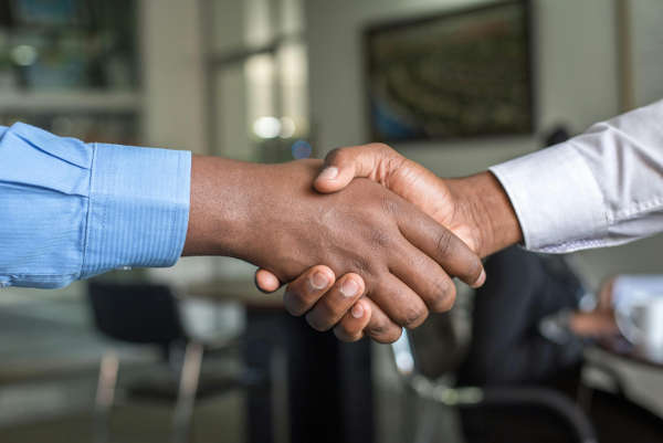 handshake after a successful settlement